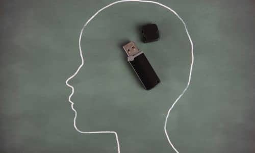 dibujo de una cabeza con un USB en vez del cerebro